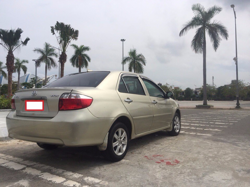 Bán Toyota Vios sản xuất 2003, màu vàng, nhập khẩu  -4