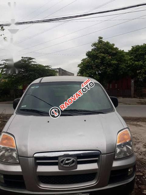 Bán ô tô Hyundai Starex đời 2004, màu bạc số sàn-0