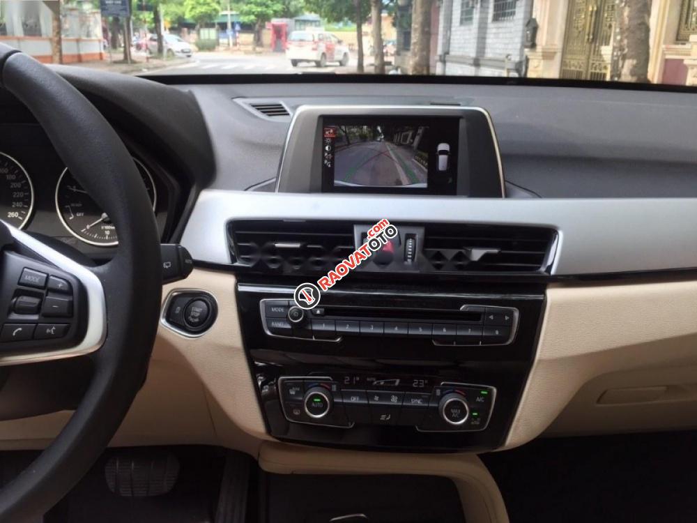 Cần bán BMW X1 Sdrive1.8i đời 2016, màu trắng, xe nhập số tự động-1