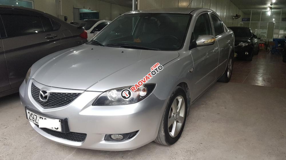 Cần bán Mazda 3 1.5 AT đời 2005, màu bạc, xe đẹp suất sắc-0