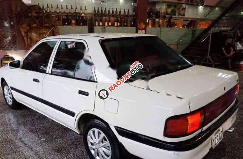Cần bán xe Mazda 323 đời 1997, màu trắng, nhập khẩu còn mới-2
