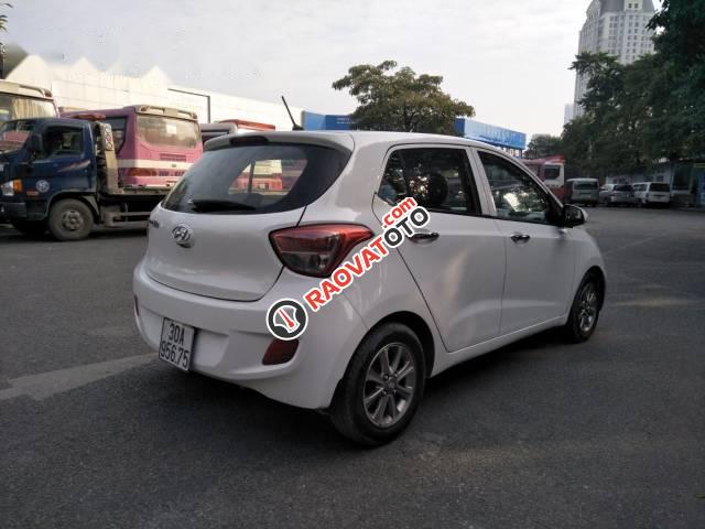 Bán ô tô Hyundai Grand i10 sản xuất 2015, màu trắng số sàn, 318 triệu-2