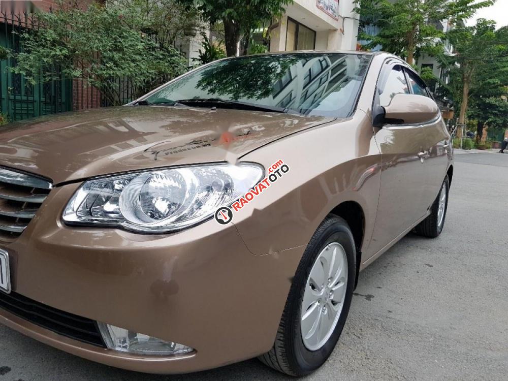 Cần bán xe Hyundai Elantra đời 2011, màu vàng xe gia đình-4