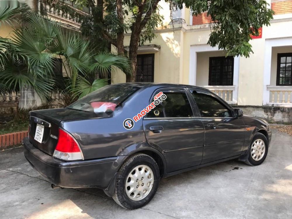 Cần bán xe Ford Laser đời 2002, màu đen chính chủ, giá tốt-0