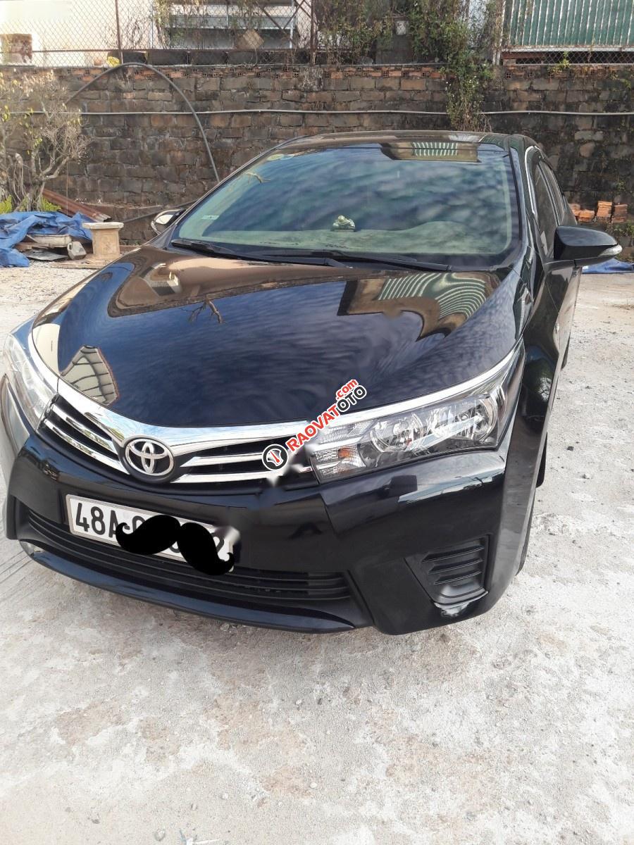 Bán Toyota Corolla altis 1.8G MT đời 2014, màu đen xe gia đình-1