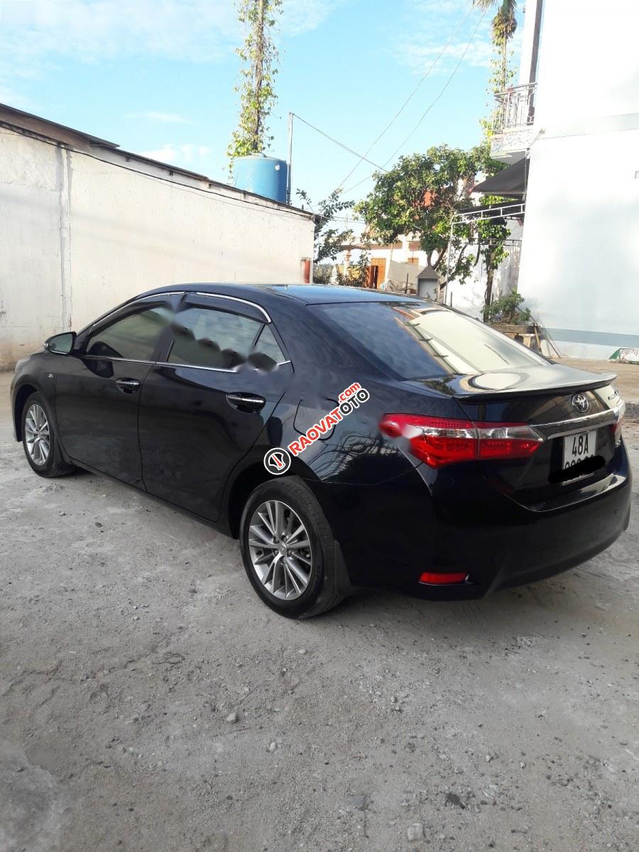 Bán Toyota Corolla altis 1.8G MT đời 2014, màu đen xe gia đình-2