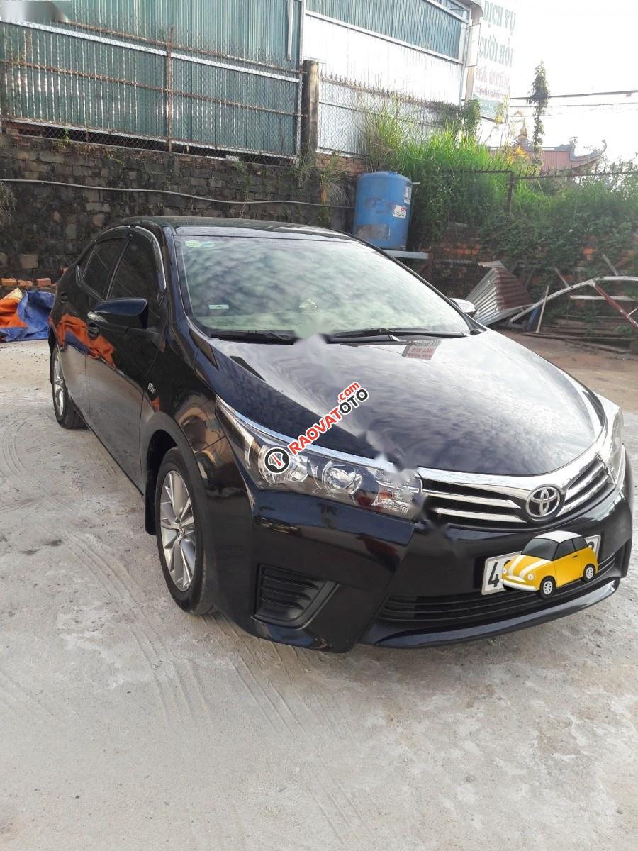 Bán Toyota Corolla altis 1.8G MT đời 2014, màu đen xe gia đình-0