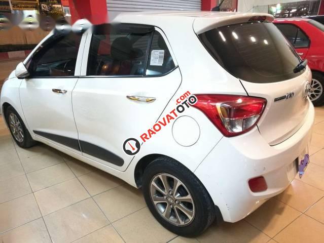 Bán gấp Hyundai Grand i10 1.2AT đời 2015, màu trắng, xe nhập-1