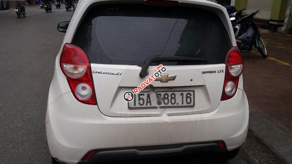 Cần bán lại xe Chevrolet Spark đời 2014, màu trắng chính chủ, giá 250tr-1