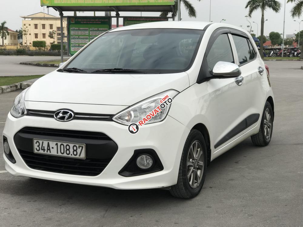 Bán Hyundai Grand i10 AT đời 2015, màu trắng, nhập khẩu nguyên chiếc xe gia đình-2