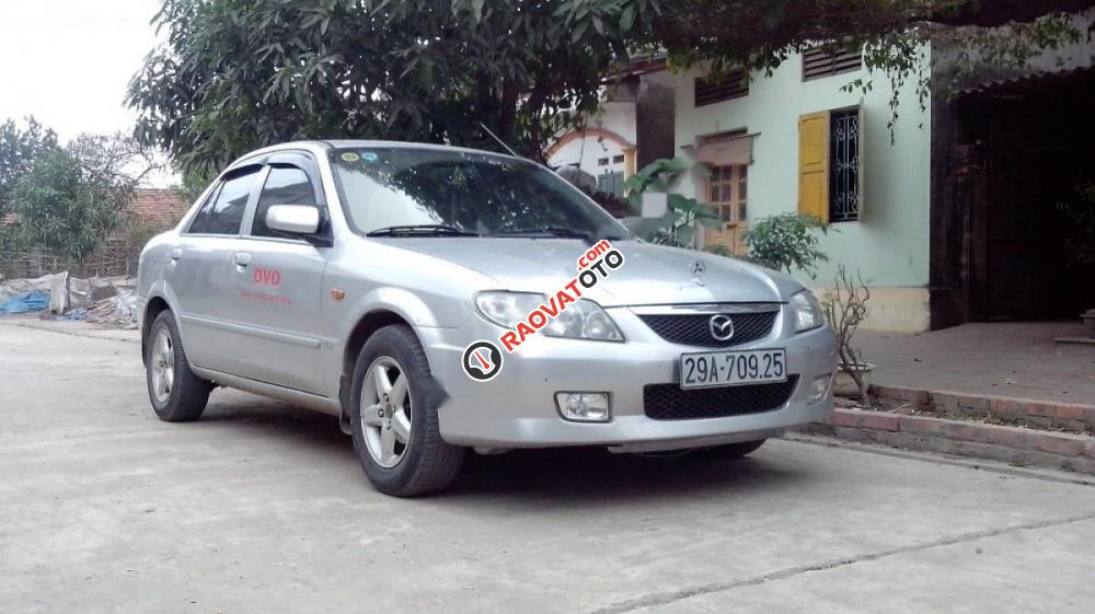 Cần bán xe Mazda 323 sản xuất 2001, màu bạc chính chủ-4