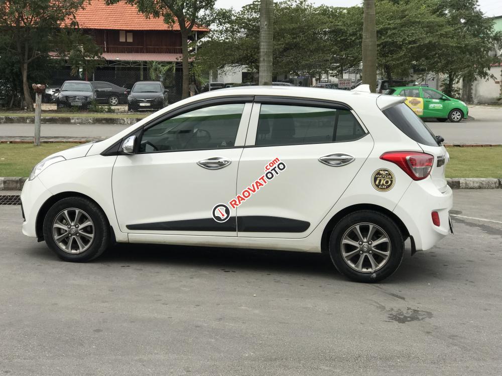 Bán Hyundai Grand i10 AT đời 2015, màu trắng, nhập khẩu nguyên chiếc xe gia đình-6