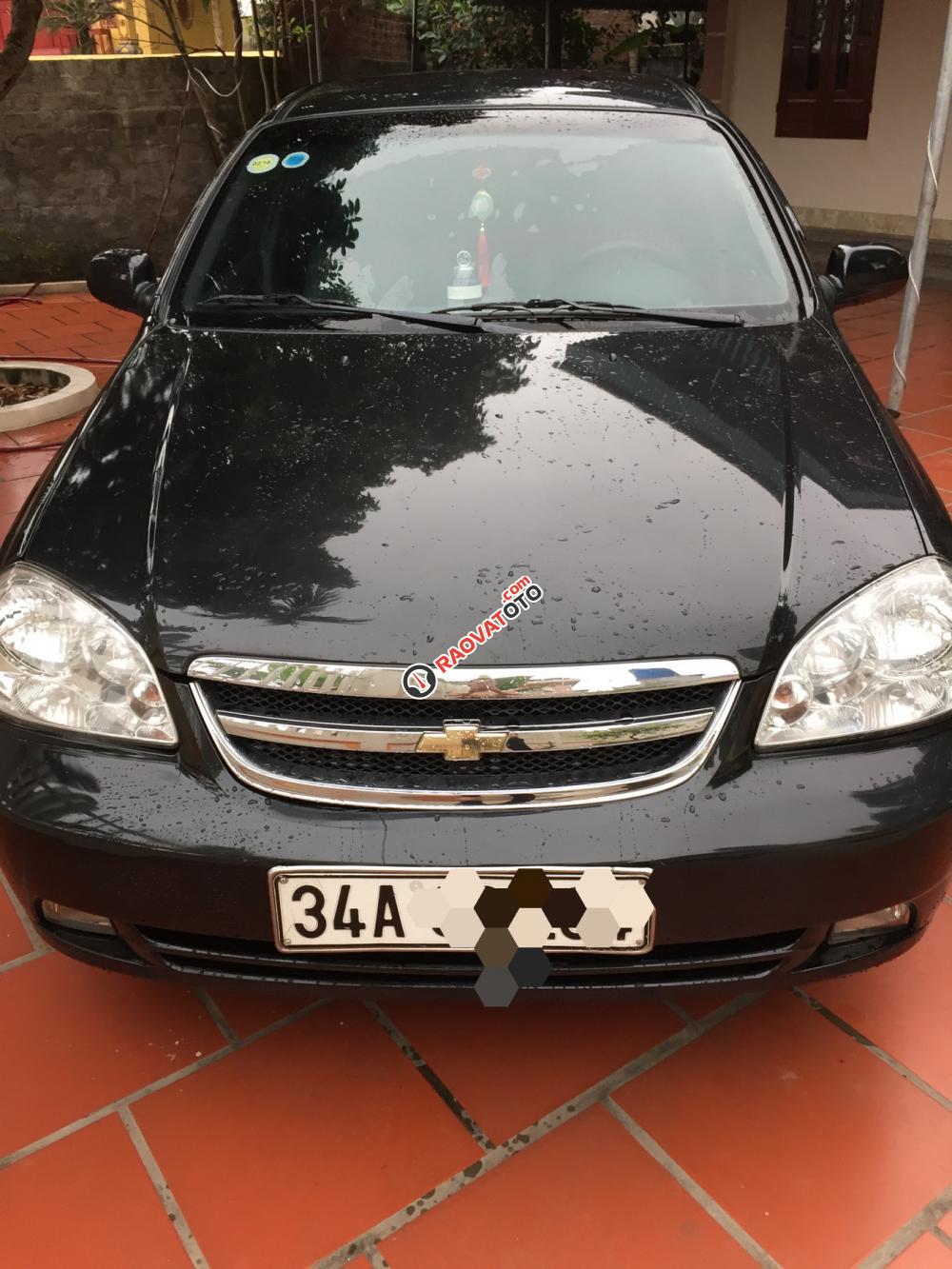 Cần bán Chevrolet Lacetti đời 2013, màu đen xe gia đình-4