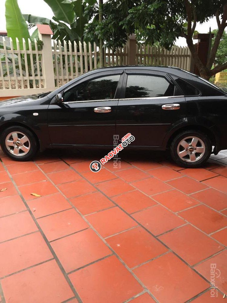 Cần bán Chevrolet Lacetti đời 2013, màu đen xe gia đình-3