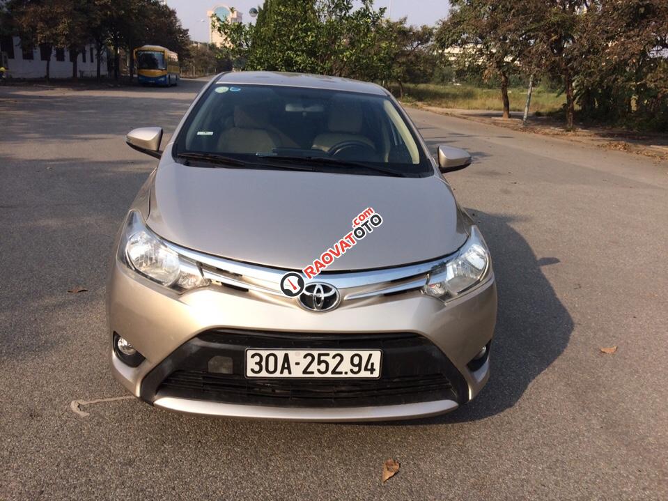 Bán Toyota Vios E đời 2014, màu vàng chính chủ-0