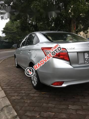 Cần bán Toyota Vios 1.5E 2015, màu bạc số sàn, giá tốt-0