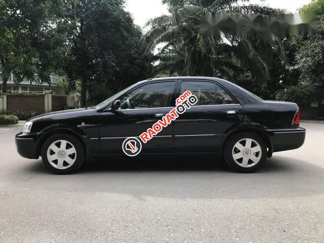 Bán Ford Laser MT đời 2004, màu đen đẹp như mới, giá chỉ 195 triệu-0