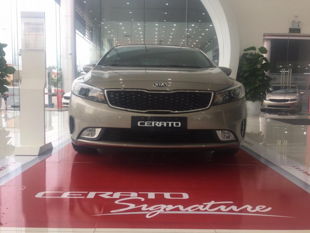 Bán xe Kia Cerato đời 2017, màu vàng, nhập khẩu-1