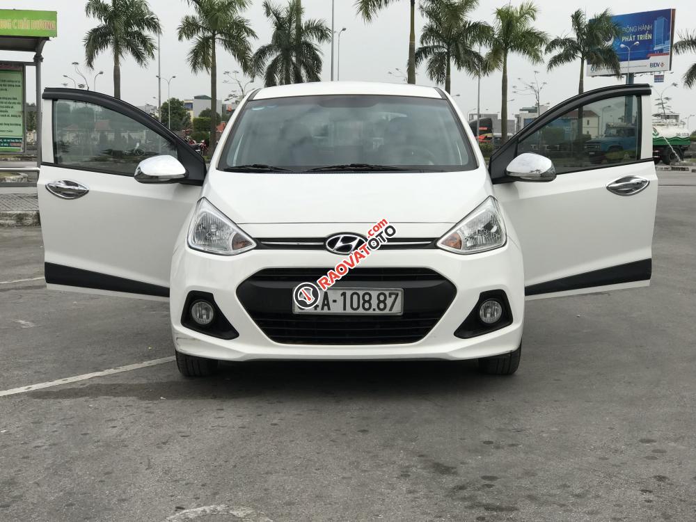 Bán Hyundai Grand i10 AT đời 2015, màu trắng, nhập khẩu nguyên chiếc xe gia đình-0