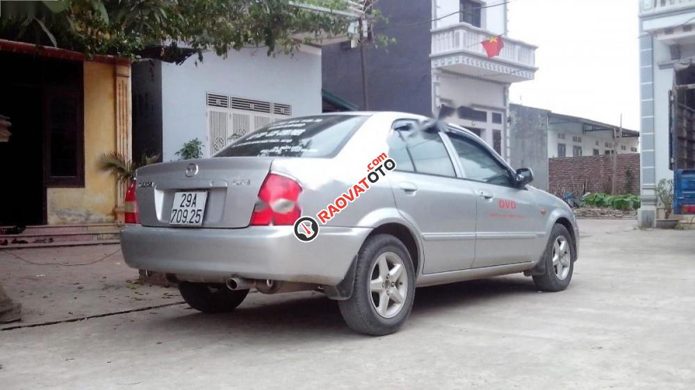 Cần bán xe Mazda 323 sản xuất 2001, màu bạc chính chủ-3