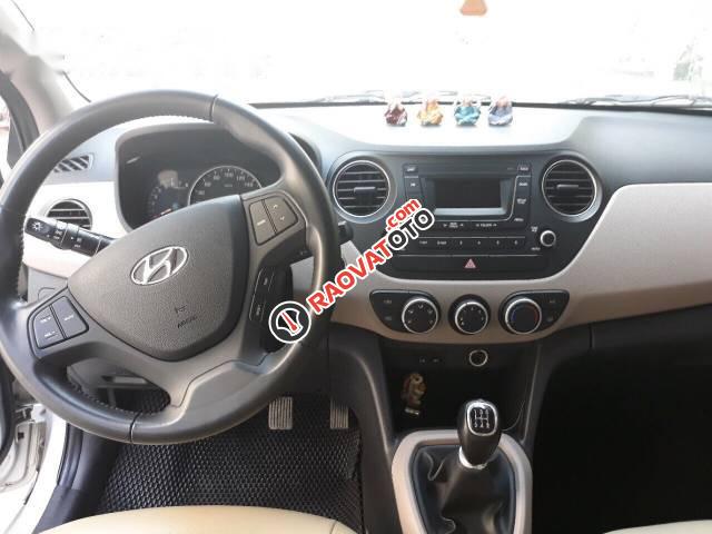 Bán ô tô Hyundai Grand i10 đời 2015, màu bạc -1