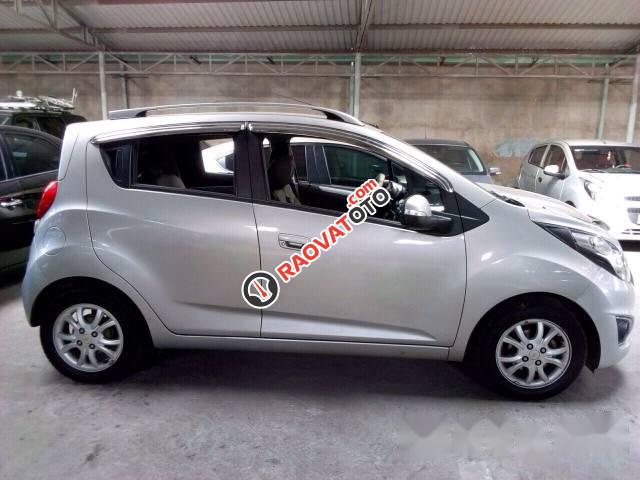 Bán Chevrolet Spark AT đời 2014, màu bạc, giá 250tr-0