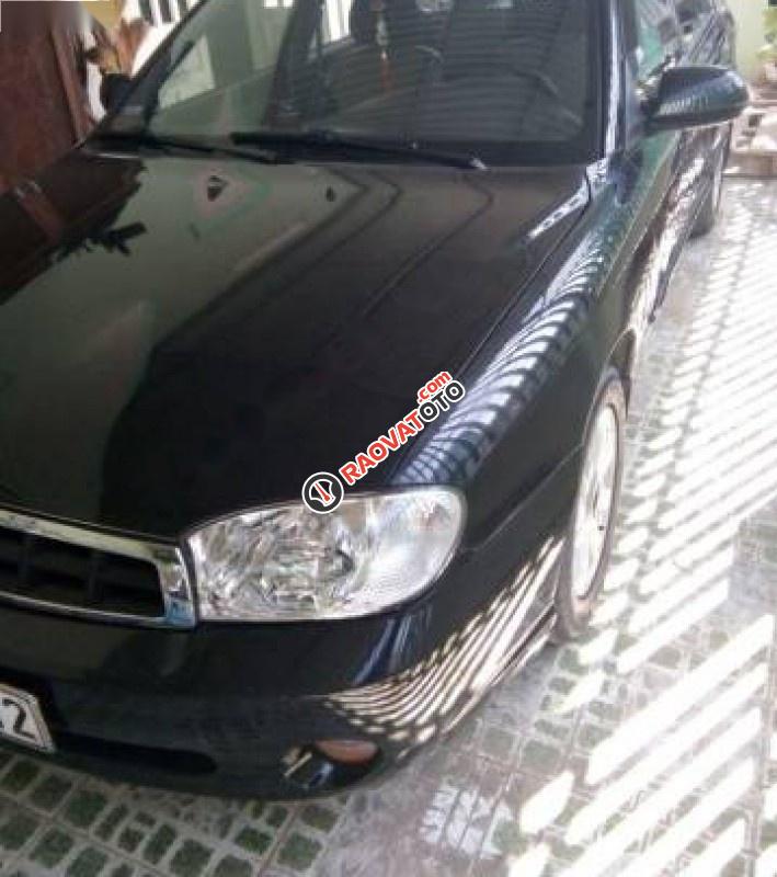 Cần bán lại xe Kia Spectra đời 2003, màu đen, giá cạnh tranh-1