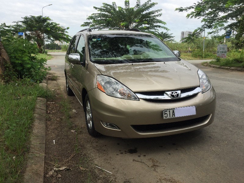 Cần bán lại xe Toyota Sienna đời 2009, màu vàng, nhập khẩu chính hãng, giá cạnh tranh-1