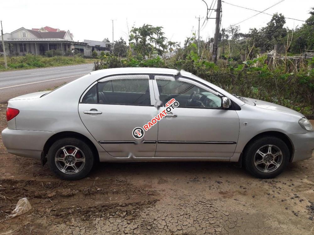 Cần bán gấp Toyota Corolla altis đời 2003, màu bạc chính chủ-0