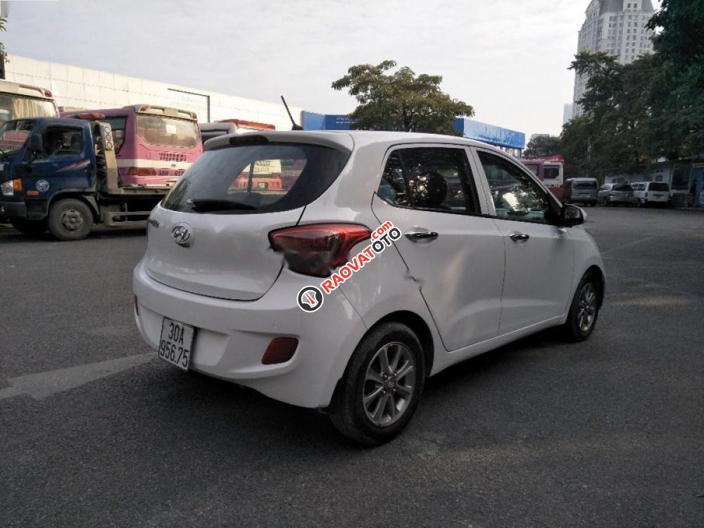 Bán ô tô Hyundai Grand i10 1.0 MT đời 2015, màu trắng, nhập khẩu nguyên chiếc số sàn-2