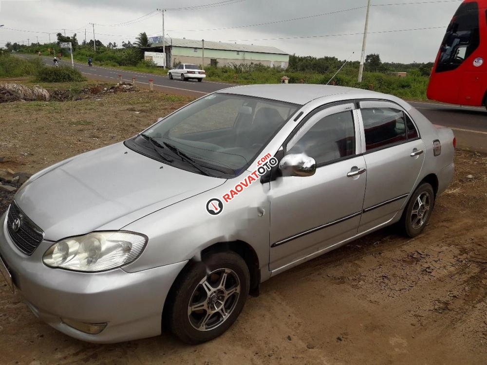 Cần bán gấp Toyota Corolla altis đời 2003, màu bạc chính chủ-1