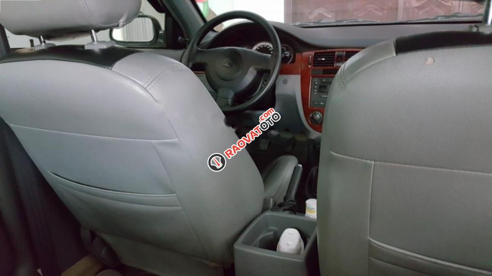 Cần bán Chevrolet Lacetti 1.6 năm 2013, màu đen xe gia đình-3