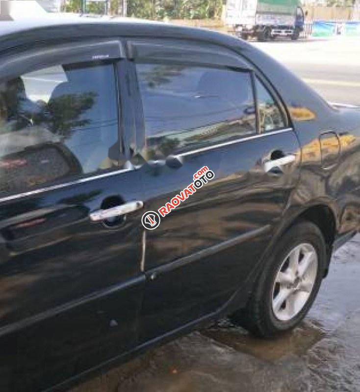 Bán xe Toyota Corolla J 1.3 MT 2003, màu đen xe gia đình, giá 246tr-0