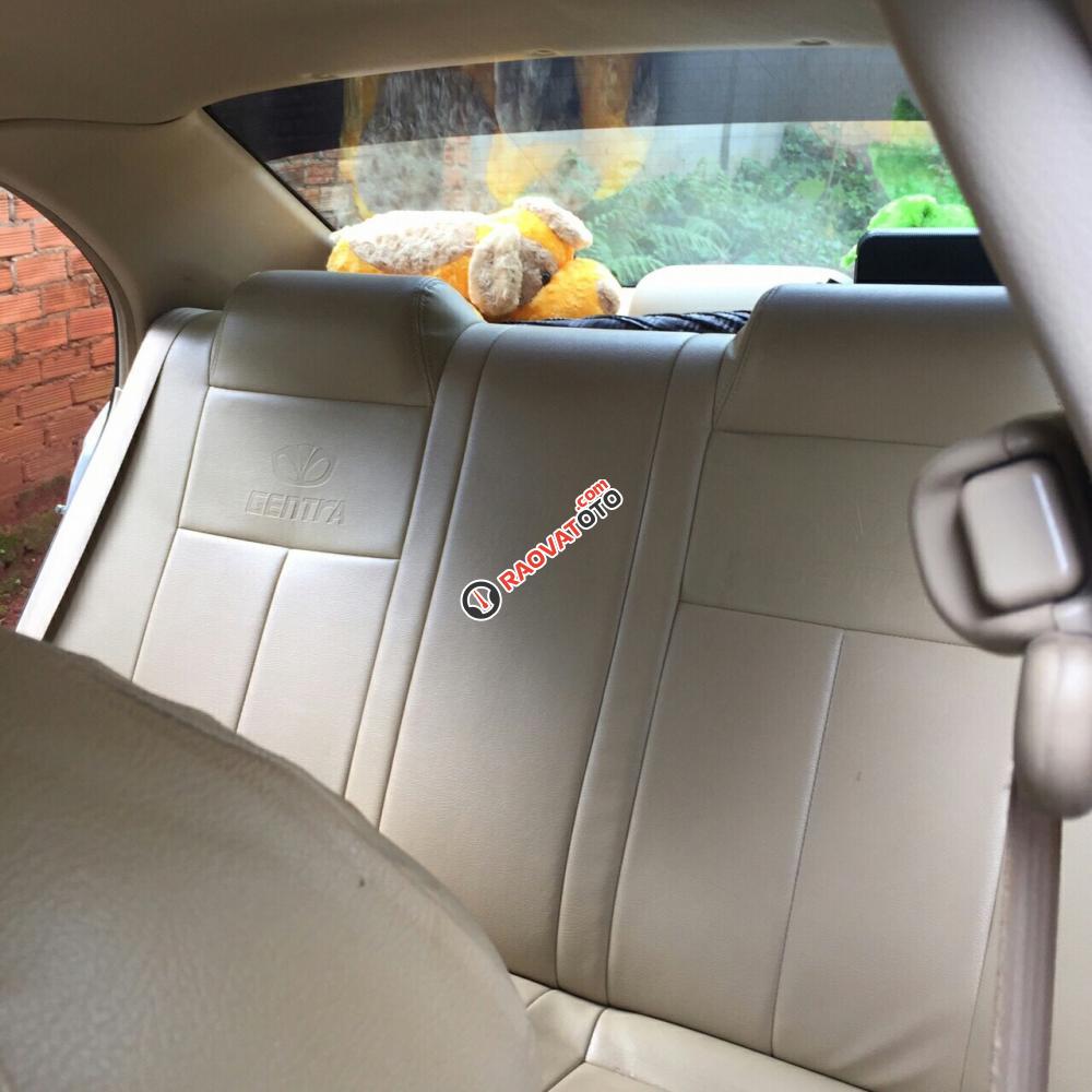 Cần bán gấp Daewoo Gentra đời 2010, màu bạc, xe gia đình-2