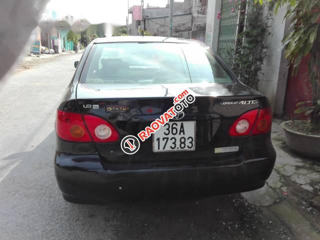 Bán Toyota Corolla altis 1.3 năm 2003, màu đen-1