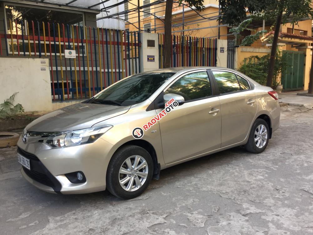 Cần bán Toyota Vios E đời 2014, màu vàng số sàn-1