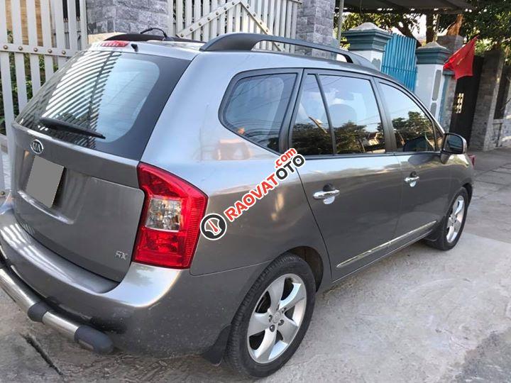 Em cần bán xe Kia Carens 2009 2.0, tự động, màu nâu xám bản full option-4