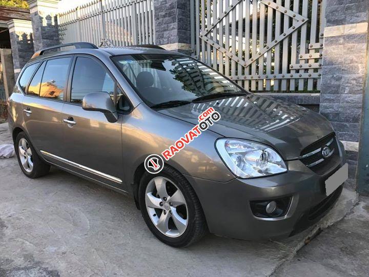 Em cần bán xe Kia Carens 2009 2.0, tự động, màu nâu xám bản full option-1