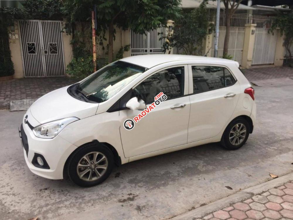 Cần bán gấp Hyundai Grand i10 1.0 MT sản xuất 2015, màu trắng, xe nhập, 345tr-1