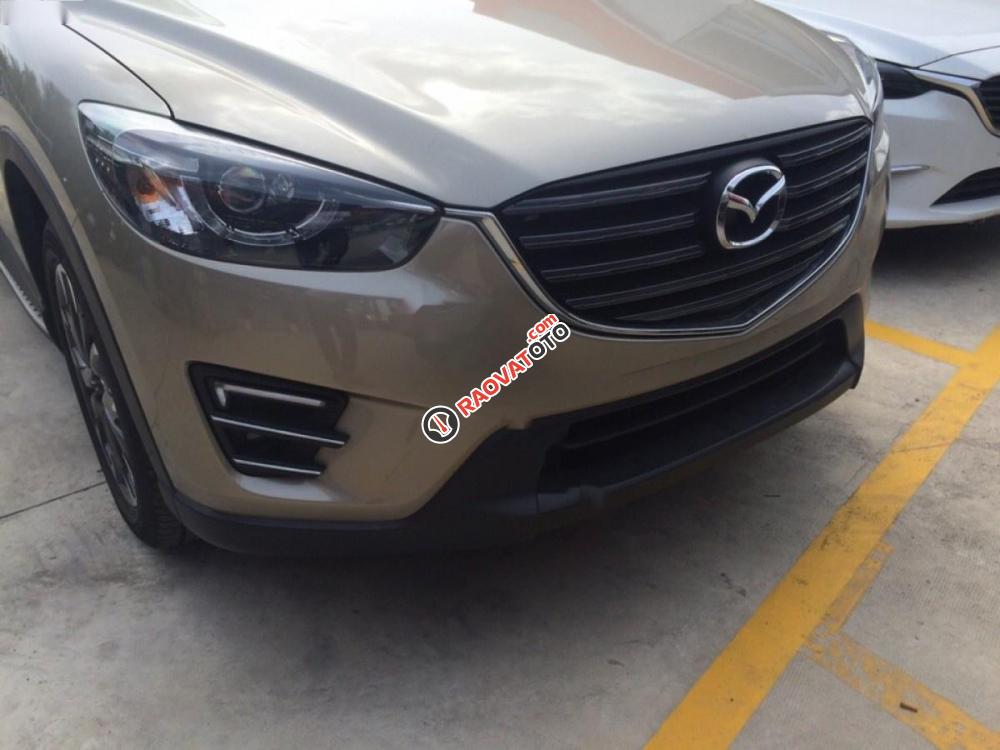 Cần bán Mazda CX 5 2.5 2WD sản xuất 2017, màu vàng-1