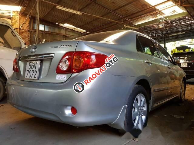 Chính chủ bán Toyota Corolla altis 1.8AT đời 2009, màu bạc-4