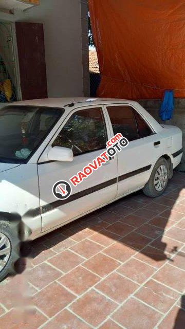 Bán Mazda 323 sản xuất 1995, màu trắng chính chủ, giá tốt-3