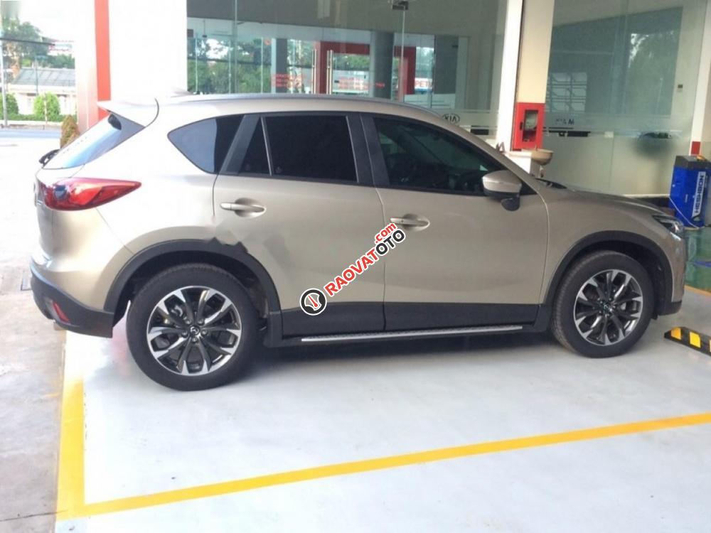 Cần bán Mazda CX 5 2.5 2WD sản xuất 2017, màu vàng-4