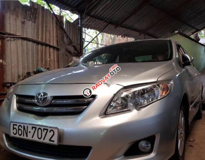 Bán Toyota Corolla altis 1.8 đời 2009, màu bạc số tự động-0