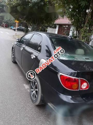 Bán xe Toyota Corolla altis 1.3 sản xuất 2003, màu đen, giá tốt-4