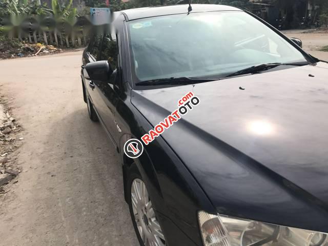 Bán lại xe Ford Mondeo năm 2004, màu đen như mới-2