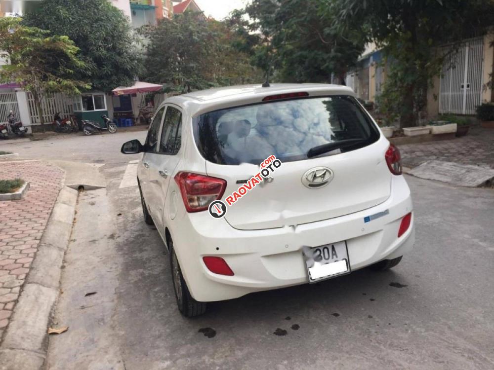 Cần bán gấp Hyundai Grand i10 1.0 MT sản xuất 2015, màu trắng, xe nhập, 345tr-0