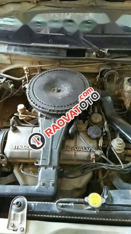 Bán gấp Mazda 323 sản xuất 1996, màu bạc, 65 triệu-0