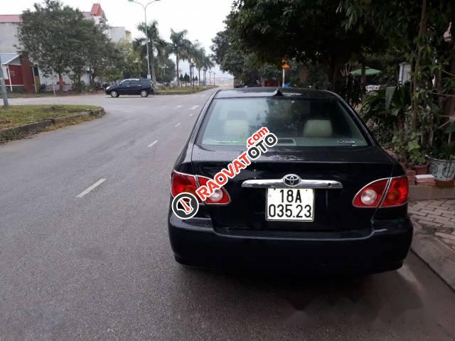 Bán xe Toyota Corolla altis 1.3 sản xuất 2003, màu đen, giá tốt-3