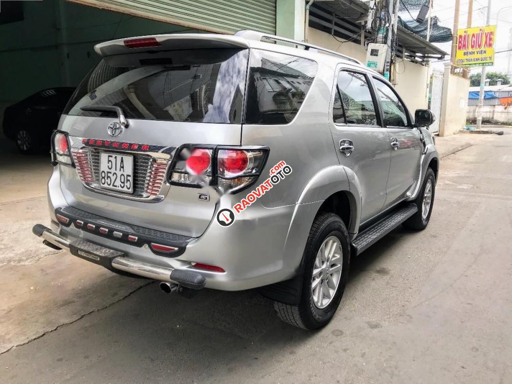 Bán Toyota Fortuner G đời 2014, màu bạc-9